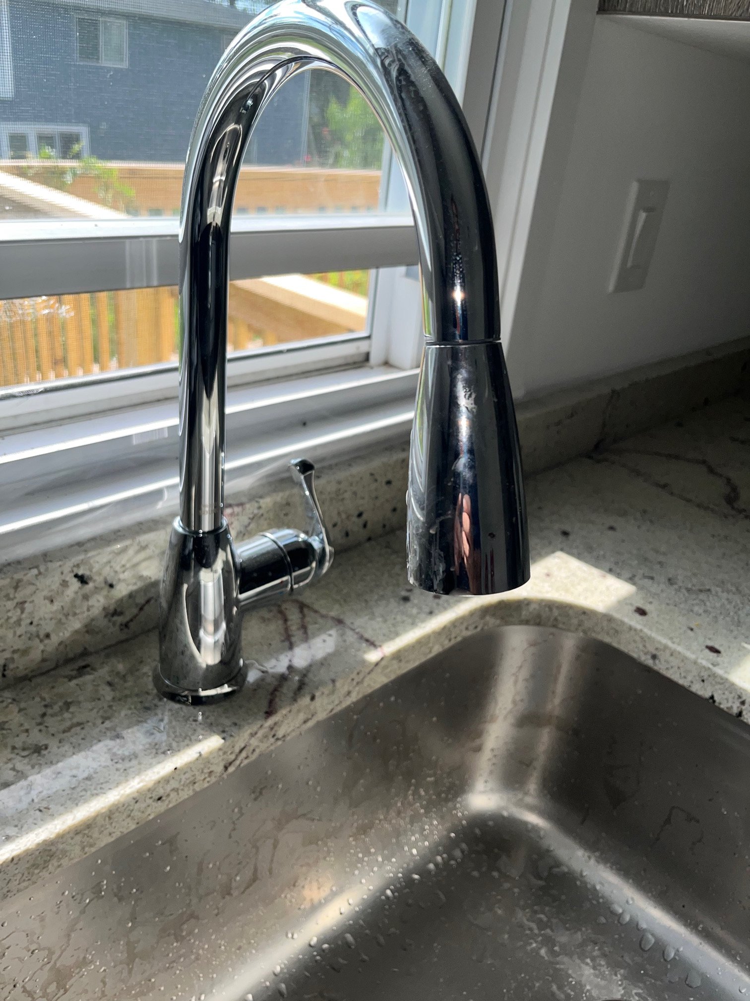 All-Plumb-Rooter Plumber installing sink faucet